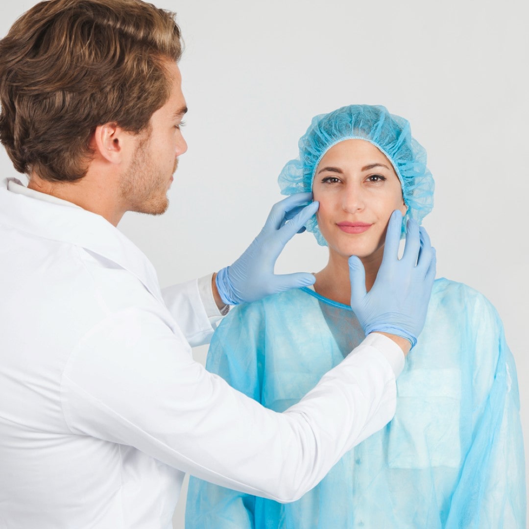 doctor-with-patient-wearing-cap